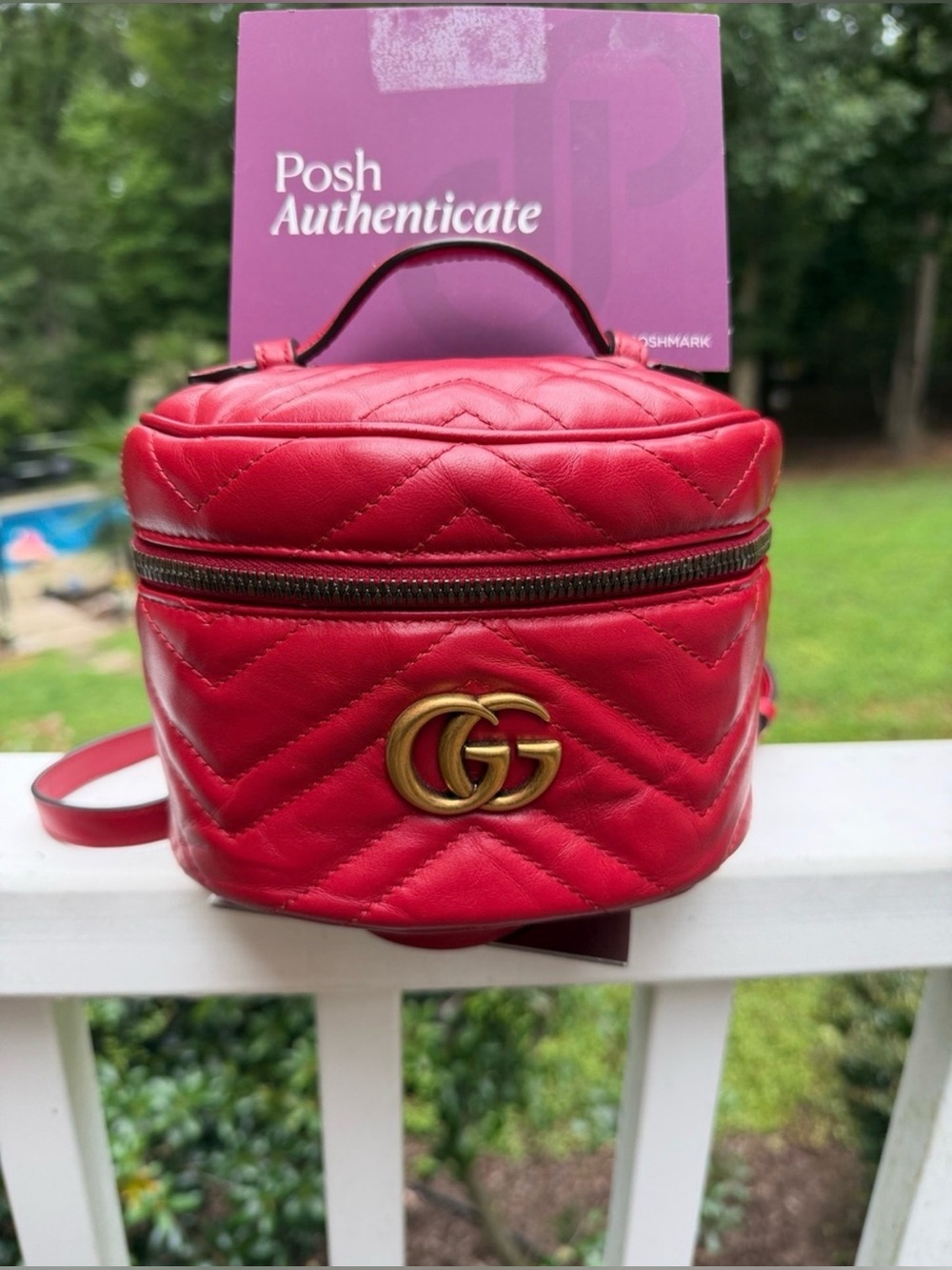 Gucci GG Marmont quilted red leather round mini backpack w/ posh authentication.